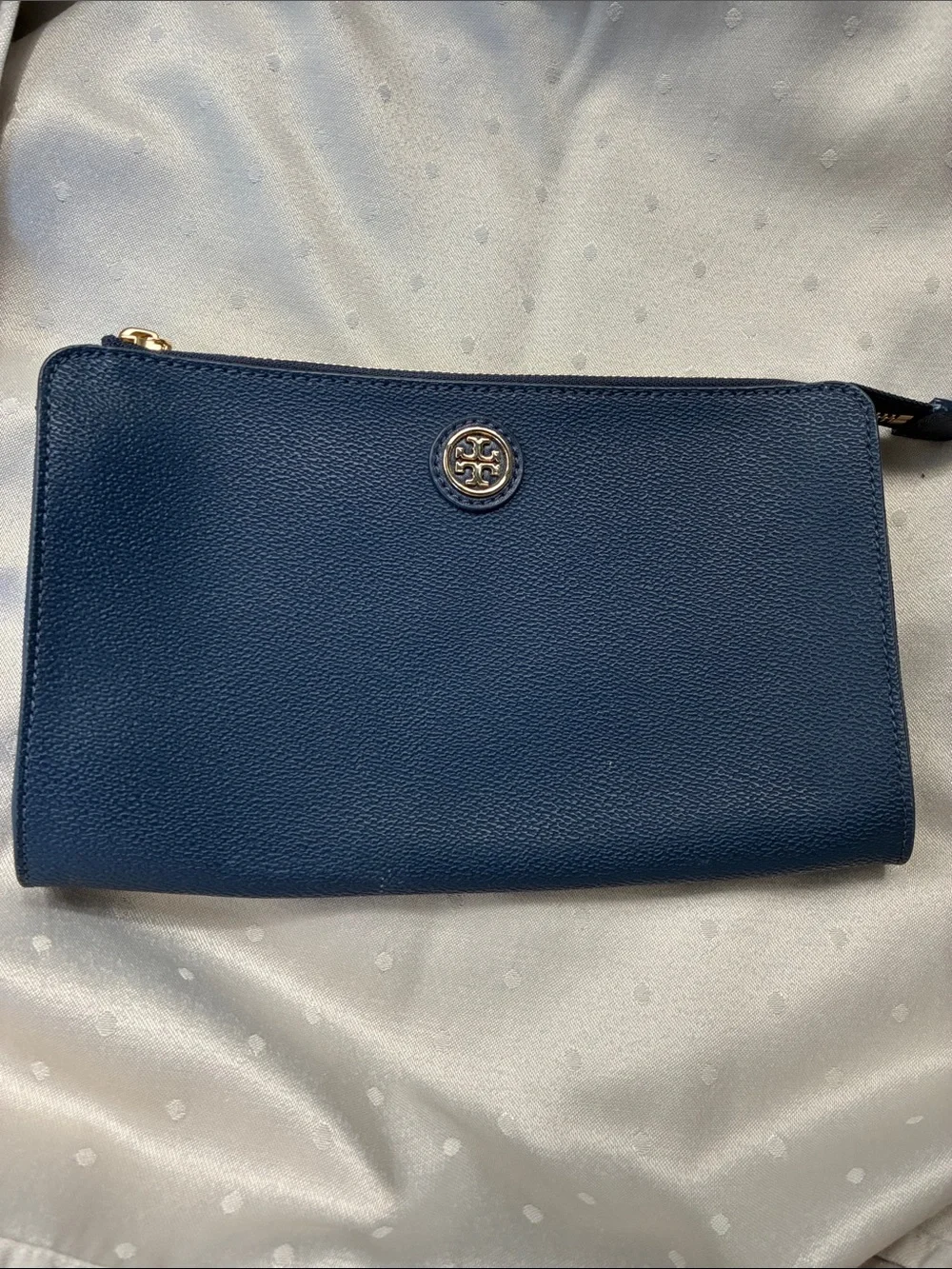 Fair condition Tory Burch Dark Navy Leather Zip pouch with Gold Logo